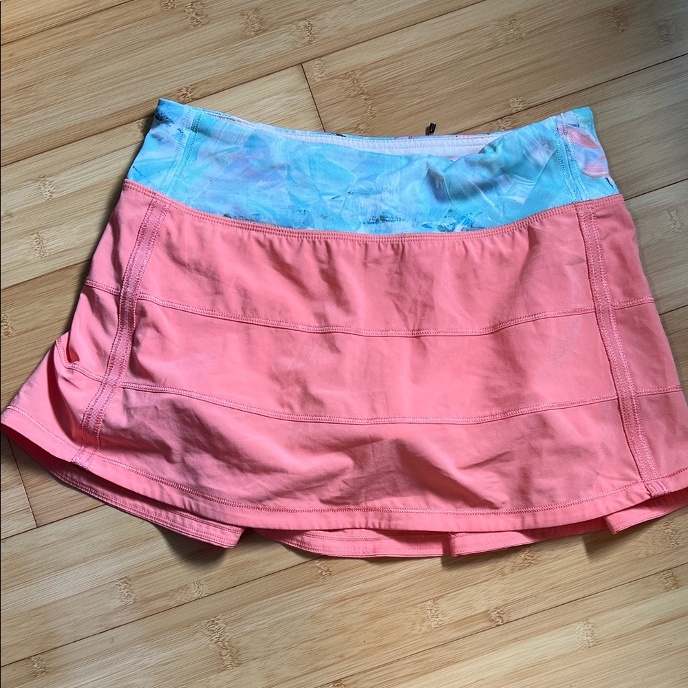 Lululemon orange skort with blue pattern band